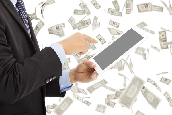 Business man touching tablet with money rain background — Stock Photo, Image