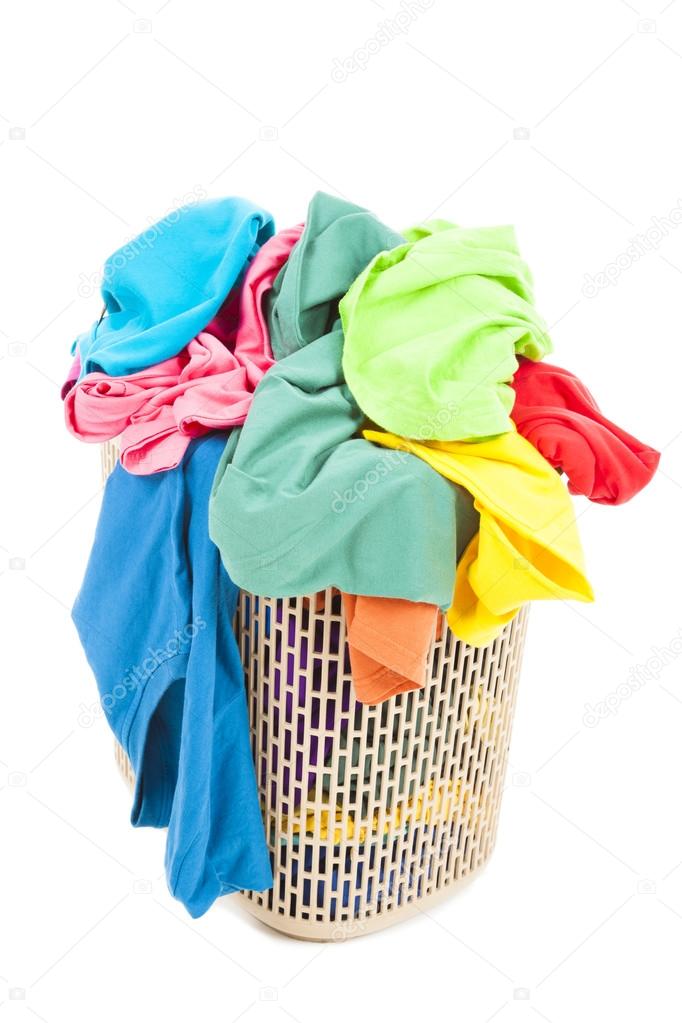 a pile of colorful and mess clothes in the basket