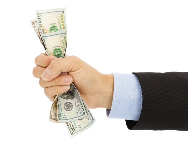 Businessman's hand grasping a handful of dollars — Stock Photo, Image