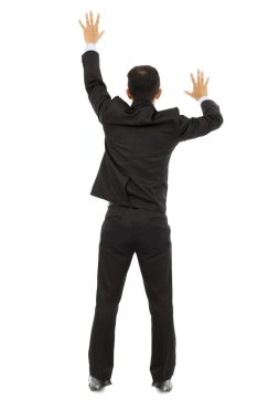   Beyaz bir duvar tırmanma genç iş adamı