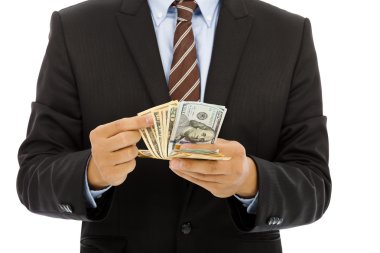 Beyaz arka plan ile dolar bize güveniyor işadamı.