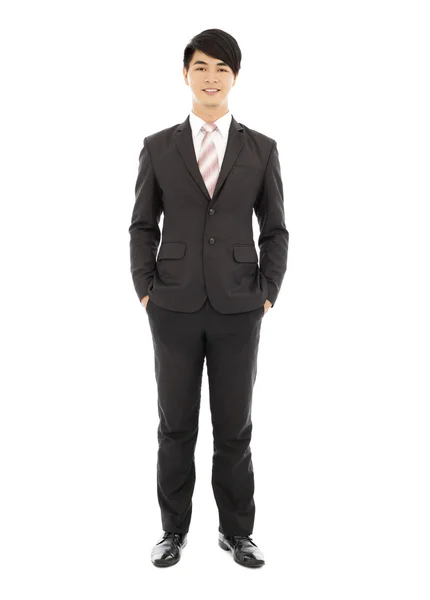 Young businessman standing and hands on pocket — Stock Photo, Image