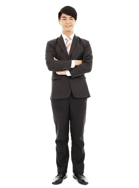 Young businessman standing isolated on white background — Stock Photo, Image