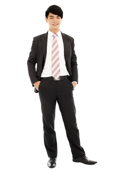 Young businessman standing and hands on pocket — Stock Photo, Image