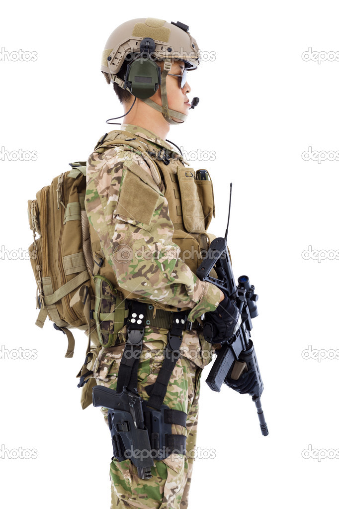 Soldier with rifle or sniper standing on a white background