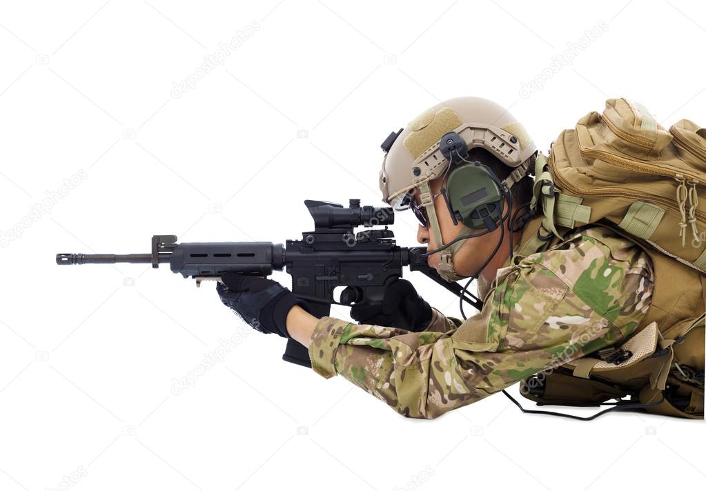  soldier holding rifle or sniper lying on the floor