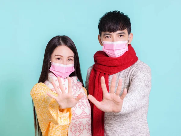 Young Couple Wearing Winter Clothes Medical Mask Showing Stop Gesture — Stock Photo, Image