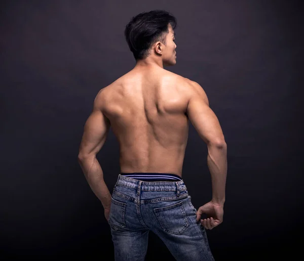 Rear View Muscular Asian Young Man — стоковое фото