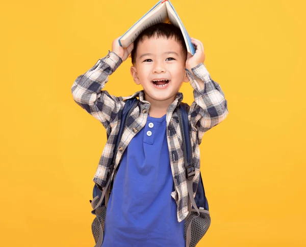 Happy Asian Kid Holding Book His Head — Foto Stock