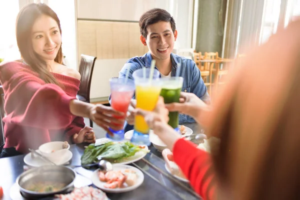 Happy Young People Toasting Having Dinner Hot Pots Restaurant — Stock Photo, Image