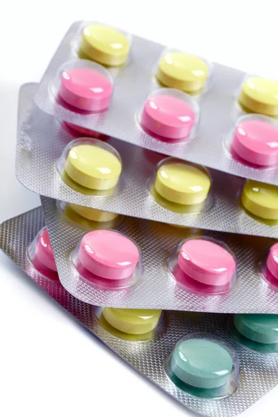 Some colorful pills on a white background — Stock Photo, Image