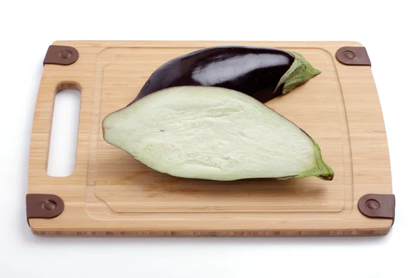 Eggplant on a wooden board — Stock Photo, Image