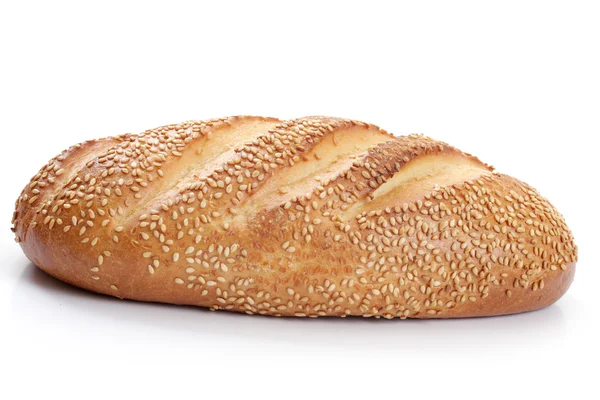 Loaf of white bread with sesame seeds — Stock Photo, Image