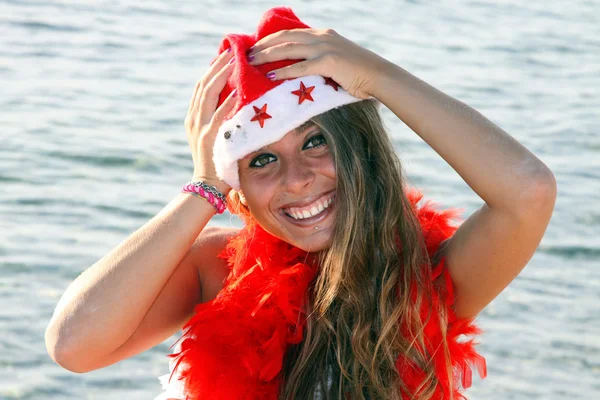 Menina Natal na praia — Fotografia de Stock