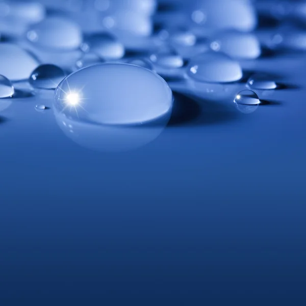 Blue Big Water Drops Background - focus on the center — Stock Photo, Image