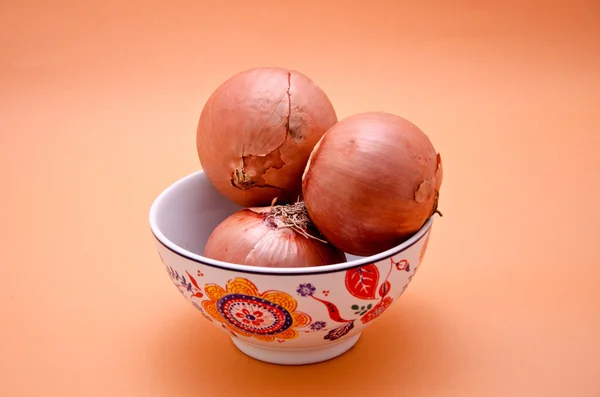 Pot with onions — Stock Photo, Image