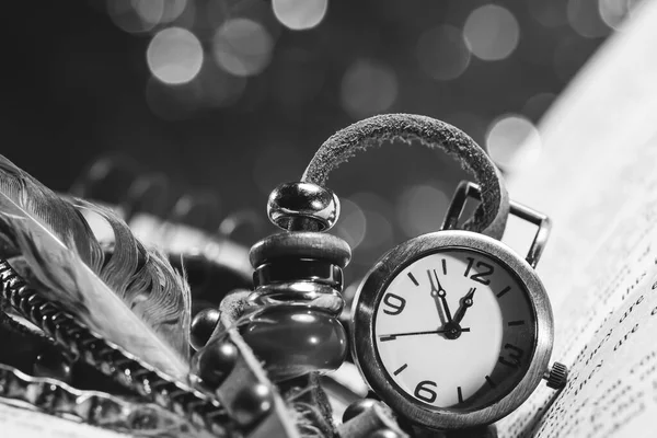 Background with book and old clock. Photo — Stock Photo, Image