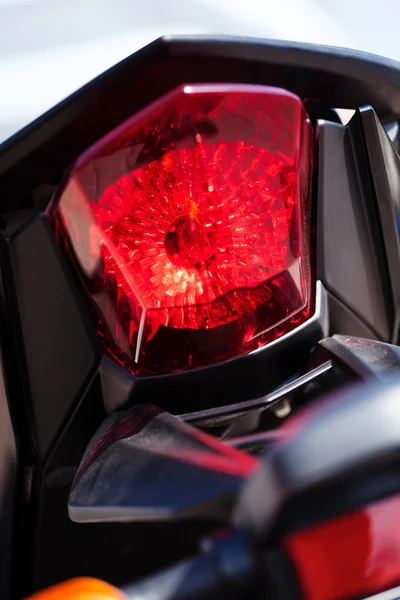 Motorfiets achterste stop licht — Stockfoto