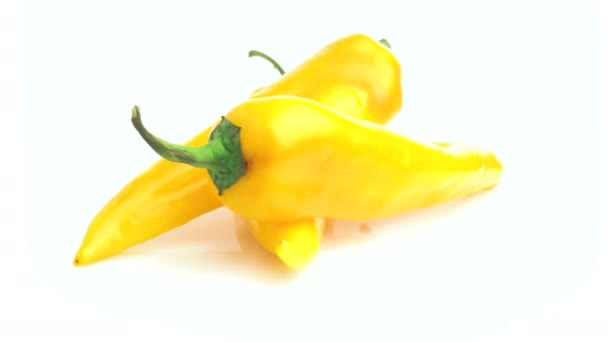 Long Yellow Pepper Isolated White Background — Stock Video