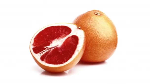 Krájené Grapefruit Izolované Bílém Pozadí — Stock video