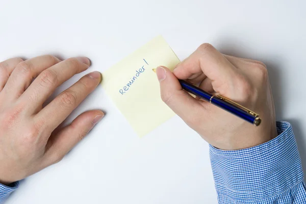 Person writing on paper — Stock Photo, Image