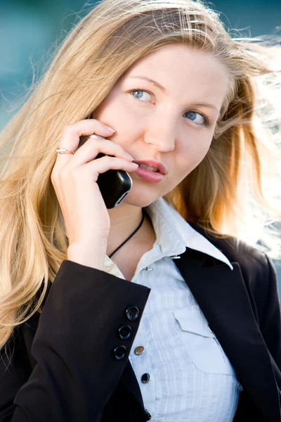 Blonde business woman on mobile phone — Stock Photo, Image