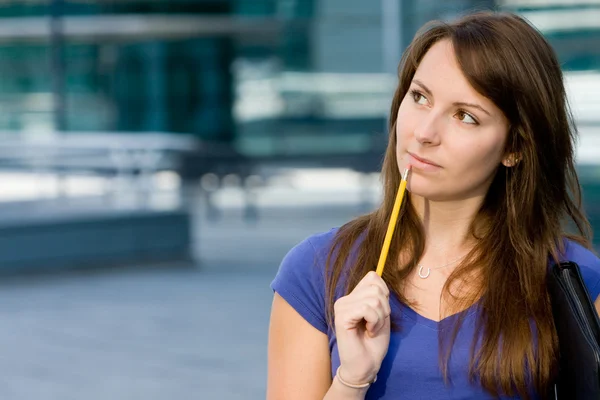 Pretty caucasian girl pondering thinking — Stock Photo, Image