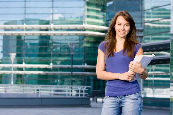 Pretty caucasian girl standing in school — Stock Photo, Image