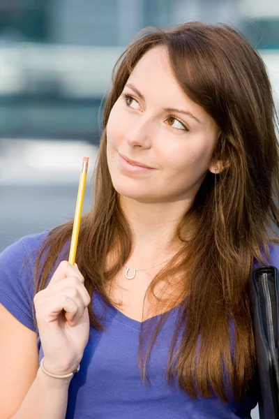 Pretty caucasian girl pondering or thinking — Stock Photo, Image