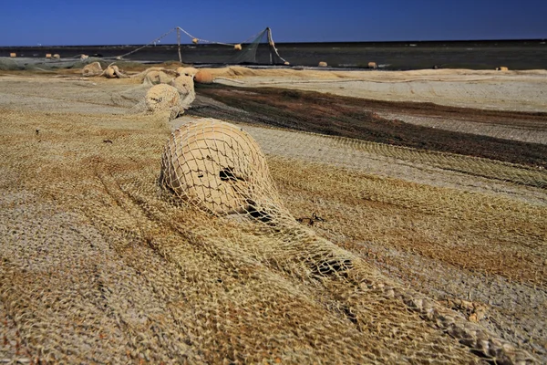 Visnet op het strand. — Stockfoto