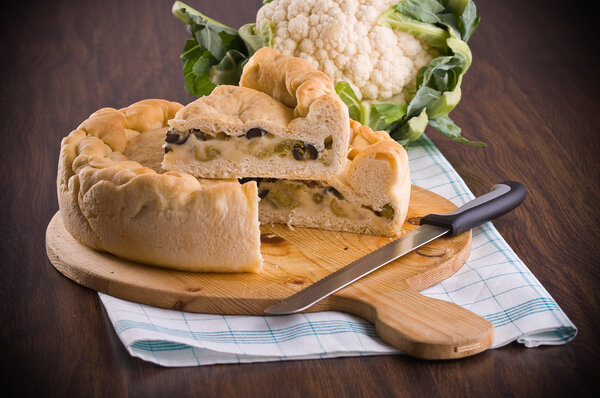 Calzone stuffed with olive and cauliflower