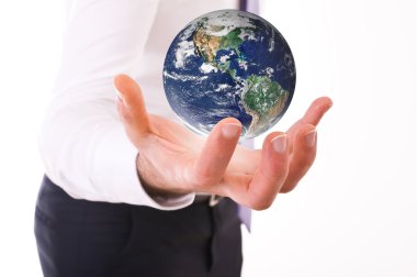 Business man carrying earth. clipart