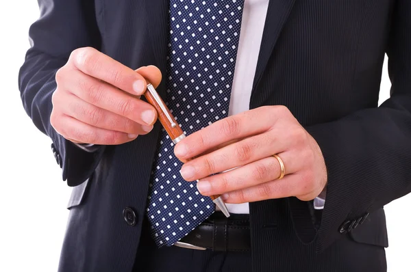 Business man holding a pen. — Stock Photo, Image