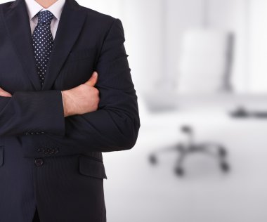 kollarını çapraz iş adamı.