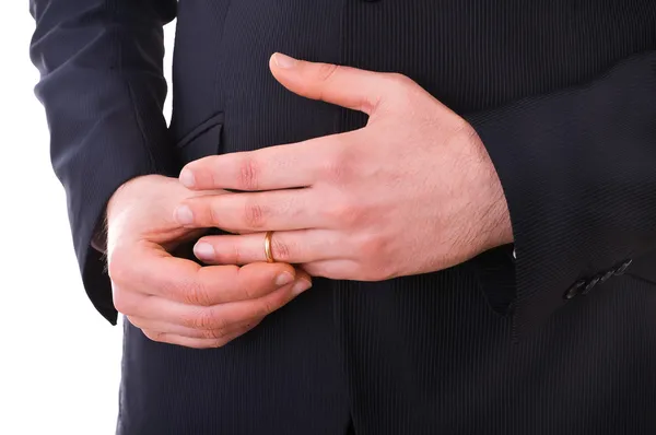 Geschäftsmann zieht seinen Ehering aus. — Stockfoto