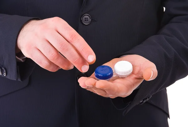 Business man with contact lens case. — Stock Photo, Image