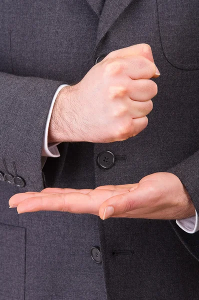 Geschäftsmann gestikuliert mit beiden Händen. — Stockfoto