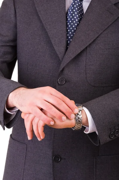 Biznesmen sprawdzania czasu na jego zegarek. — Zdjęcie stockowe