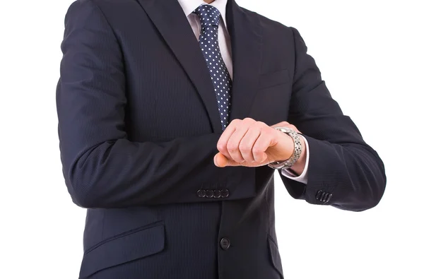 Hombre de negocios comprobando el tiempo en su reloj de pulsera . — Foto de Stock