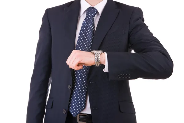 Hombre de negocios comprobando el tiempo en su reloj de pulsera . — Foto de Stock