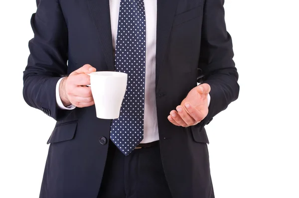 Empresário segurando uma xícara de café. — Fotografia de Stock