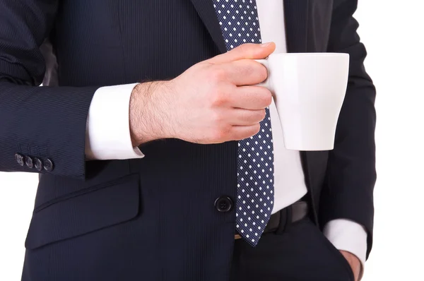 Businessman holding a cup of coffee. — Stock Photo, Image