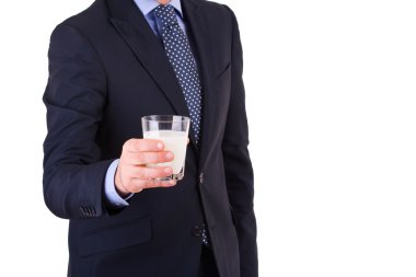 bir bardak süt ile işadamı.