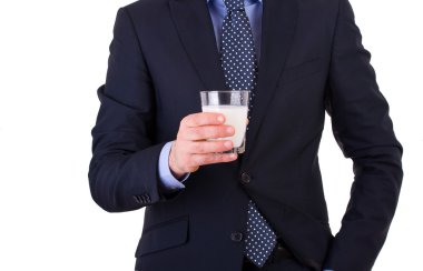 bir bardak süt ile işadamı.