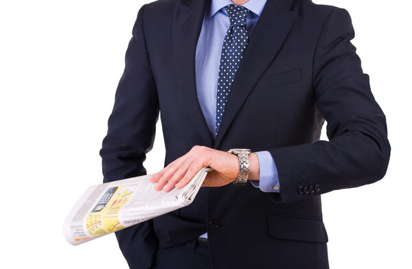 Businessman checking time on his wristwatch.