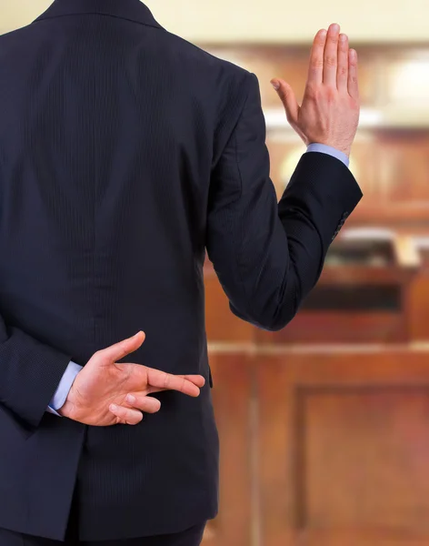 Business man with fingers crossed. — Stock Photo, Image