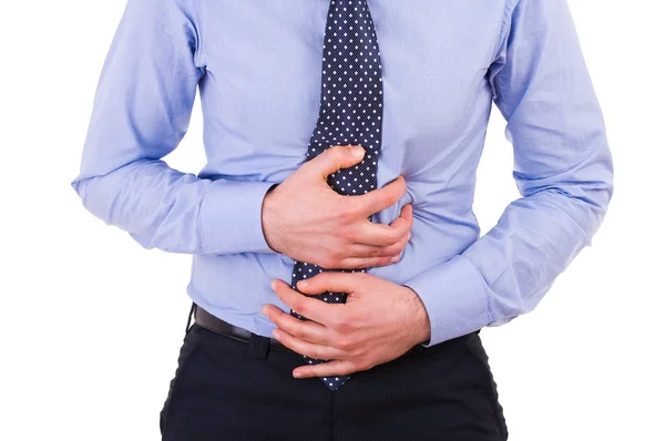 Businessman suffering from stomach pain. — Stock Photo, Image