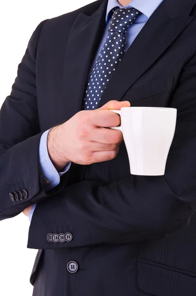 Επιχειρηματίας κρατώντας ένα φλιτζάνι καφέ. — Φωτογραφία Αρχείου