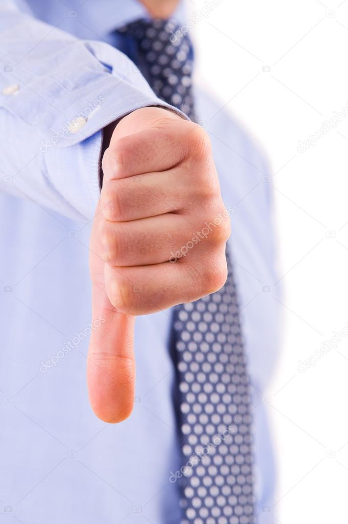 Business man showing thumbs down sign.