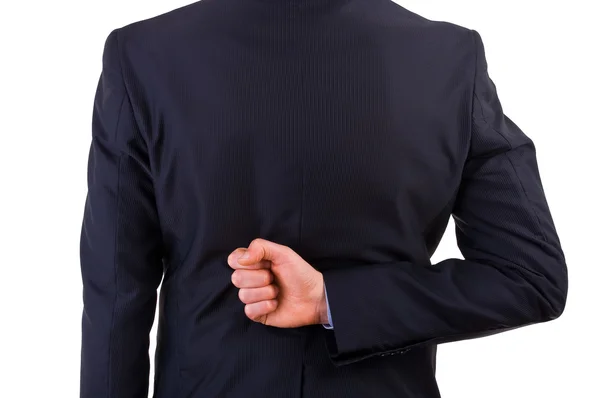 Businessman with his hand behind his back. — Stock Photo, Image
